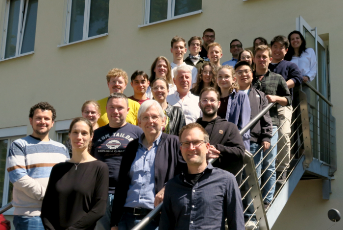 The members of the collaboration at the meeting in April 2026